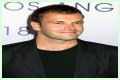 Jonny Lee Miller flashes ink for Ellen charity